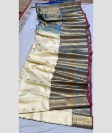 cream colour gadwal pattu sarees with All over Buttas design