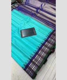 blue and silver colour gadwal pattu sarees with All over Lines design