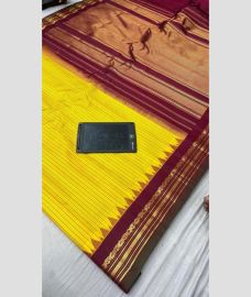 yellow and brown colour gadwal pattu sarees with All over Lines design