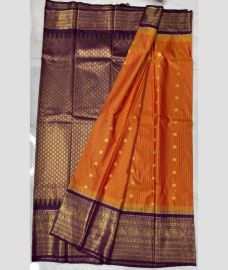orange and brown colour gadwal pattu sarees with All over Buttas design
