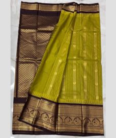 olive green and brown colour gadwal pattu sarees with All over Buttas design