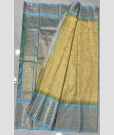 grey and silver colour gadwal pattu sarees with All over Buttas design