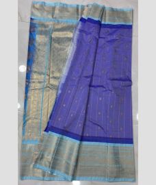 blue and silver colour gadwal pattu sarees with All over Buttas design