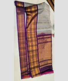 gray and brown colour gadwal sico sarees with All over Checks and Buttas design