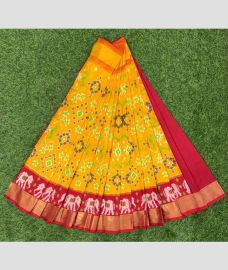 Yellow and Deep Pink ikkat lehengas with All over Pochampally design