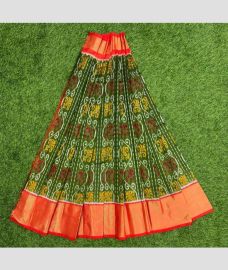 Green and Orange ikkat lehengas with all over pochampally ikkat design