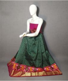 Pine Green and Golden ikkat lehengas with all over pochampally ikkat design