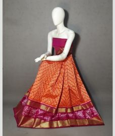 Orange and Neon Pink ikkat lehengas with all over pochampally ikkat design