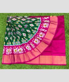 green and purple colour ikkat lehengas with all over pochampally ikkat design