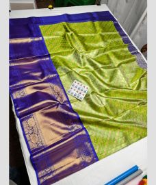 Parrot Green and Navy Blue kanchi lehengas with All over design