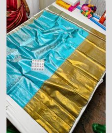 Blue Turquoise and Golden Brown kanchi lehengas with All over design
