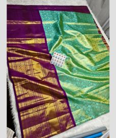Turquoise and Dark Magenta kanchi lehengas with All over design