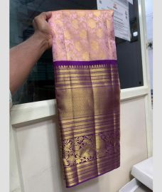 Baby Pink and Purple kanchi lehengas with all over jari design