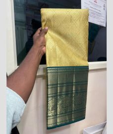 Lite Golden and Teal kanchi lehengas with all over jari design