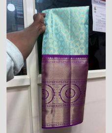 Turquoise and Purple kanchi lehengas with all over jari design