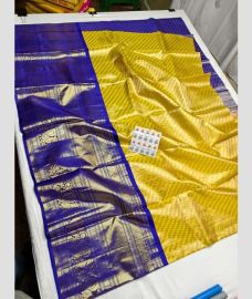 Golden Yellow and Royal Blue kanchi lehengas with Kanchi Border design