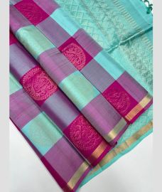 Sky Blue and Magenta kanchi lehengas with All over Checks and Buttas design
