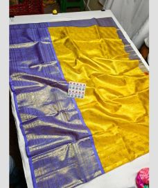 Yellow and Blue kanchi lehengas with All over design