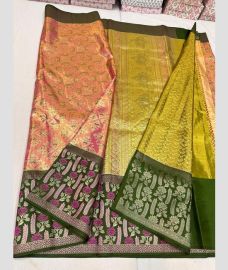 Copper and Green kanchi pattu sarees with MEENA WEAVEING WITH JAMMUN BORDER design