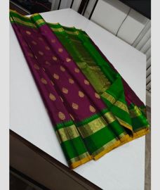 Dark Magenta and Green kanchi pattu sarees with Double Border design