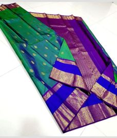 Green and Royal Blue kanchi pattu sarees with Gap Border design