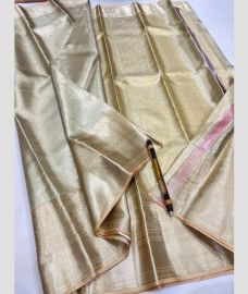 Lite Brown and Golden kanchi pattu sarees with All over Jari design