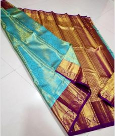 Turquoise and Purple kanchi pattu sarees with Koravai Border design