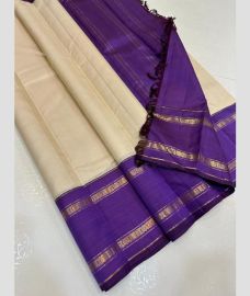 Cream and Purple kanchi pattu sarees with Koravai Border design