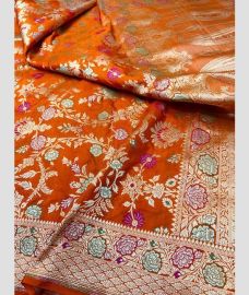 Orange and Silver kanchi pattu sarees with All over Meenakari design