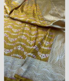 Yellow and Silver kanchi pattu sarees with All over Meenakari design