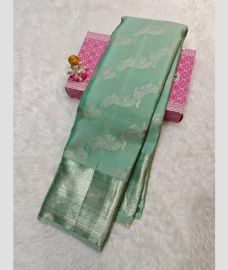 Turquoise Green and Silver kanchi pattu sarees with All over brocade design