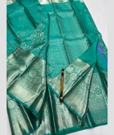 Turquoise and Silver kanchi pattu sarees with All over Jari design