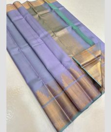 Lavender and Golden kanchi pattu sarees with Temple Border design