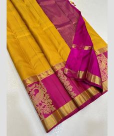 Mango Yellow and Pink kanchi pattu sarees with All over Jari design