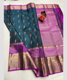 purple and green colour kanchi pattu sarees with All over design