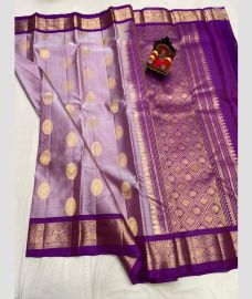purple colour kanchi pattu sarees with All over Buttas design