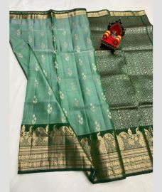 green colour kanchi pattu sarees with All over design