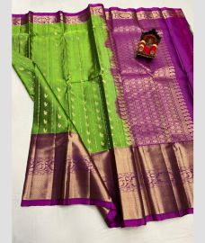 green and purple colour kanchi pattu sarees with All over Buttas design
