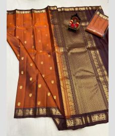 brown and brown colour kanchi pattu sarees with All over Buttas design
