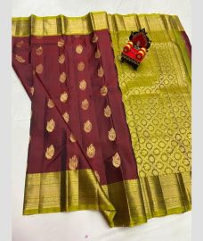 magenta and olive colour kanchi pattu sarees with All over Buttas design