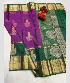 purple and green colour kanchi pattu sarees with All over Buttas design