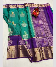 greeb and violet colour kanchi pattu sarees with All over Buttas design