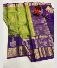 green and violet colour kanchi pattu sarees with All over Buttas design
