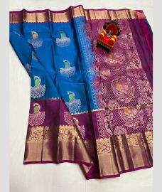 blue and brown colour kanchi pattu sarees with All over Buttas design