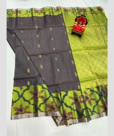 gray and green colour kanchi pattu sarees with pochampally border design