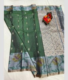 green and silver colour kanchi pattu sarees with pochampally border design