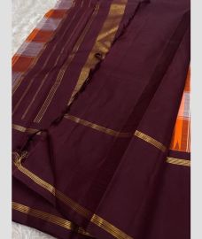orange and white colour kanchi pattu sarees with All over Checks design