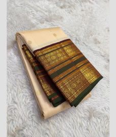 ice cream colour kanchi pattu sarees with All over Buttas design