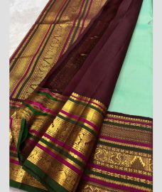 purple colour kanchi pattu sarees with All over Buttas design