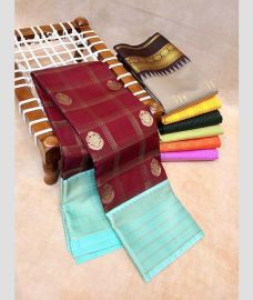 purple colour kanchi pattu sarees with All over Buttas design